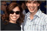 Christopher Gorham and wife Anel Lopez Gorham. Lucas is out of frame, because he's a little kid, and therefore way, way shorter than his dad. Sorry kiddo!